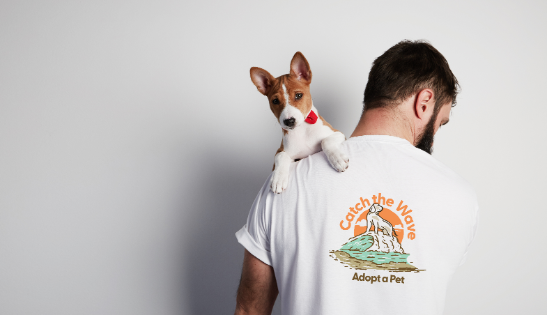small dog on guys shoulder
